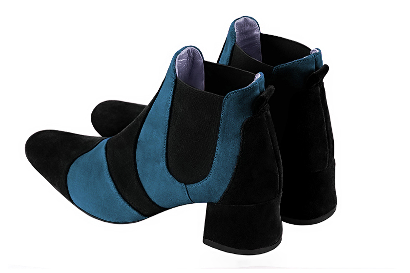 Matt black and peacock blue women's ankle boots, with elastics. Round toe. Low flare heels. Rear view - Florence KOOIJMAN